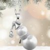 Rhodium-plated snowman necklace with pearl-like beads on a festive background